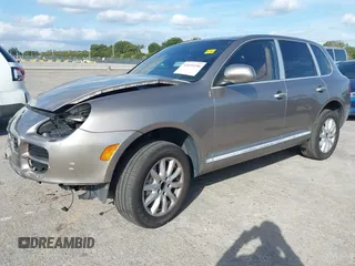 2005 Porsche Cayenne S with VIN WP1AB29P75LA61263, listed as a IAAI auction lot 41635350 with 242,874 mi miles. Bid and sale history available at carsss.com. Image 18.