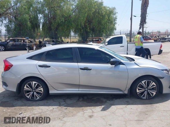 2018 Honda Civic EX-L z VIN JHMFC1F79JX037843, wystawiony jako IAAI lot #42121623 z przebiegiem 49 759 mil mil oraz . Historia ofert i sprzedaży dostępna na DreamBid. Obrazek 14.