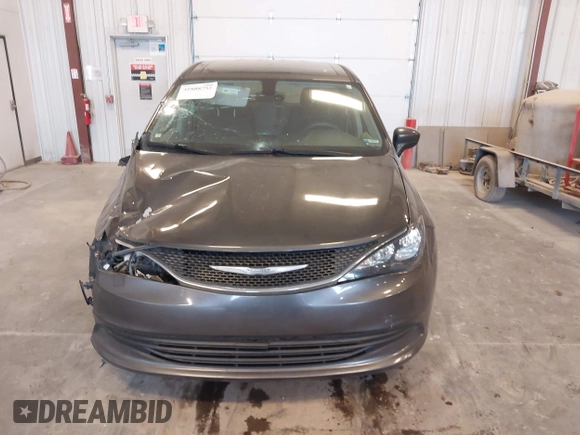 2017 Chrysler Pacifica Touring with VIN 2C4RC1DGXHR502480, listed as a IAAI auction lot 41888752 with 134,923 mi miles and . Bid and sale history available at DreamBid. Image 12.
