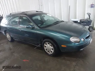 1997 Ford Taurus GL with VIN 1FALP57U2VA228703, listed as a IAAI auction lot 41515253 with 94,948 mi miles. Bid and sale history available at carsss.com. Image 1.