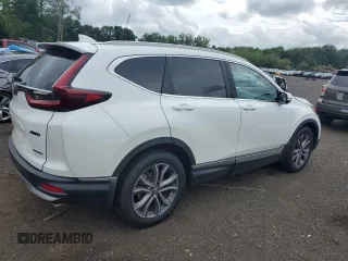 2020 Honda CR-V Touring z VIN 2HKRW2H90LH645727, wystawiony jako Copart lot #62077365 z przebiegiem 58 614 mil mil oraz Szkoda całkowita • Salvage title. Historia ofert i sprzedaży dostępna na DreamBid. Obrazek 3.