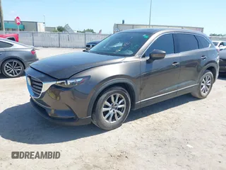 2019 Mazda CX-9 Touring with VIN JM3TCACY9K0304899, listed as a IAAI auction lot 42167180 with 57,043 mi miles and . Bid and sale history available at DreamBid. Image 2.