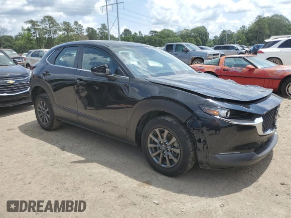 2023 Mazda CX-30 S with VIN 3MVDMBAM6PM513651, listed as a Copart auction lot 57432955 with 49,851 mi miles and Salvage title. Bid and sale history available at DreamBid. Image 4.