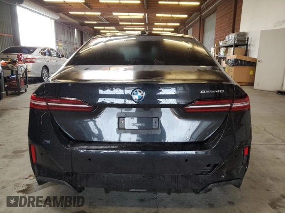 2024 BMW i5 eDrive40 z VIN WBY33FK07RCP43401, wystawiony jako Copart lot #79097314 z przebiegiem 19 914 mil mil oraz Szkoda całkowita • Salvage title. Historia ofert i sprzedaży dostępna na DreamBid. Obrazek 6.