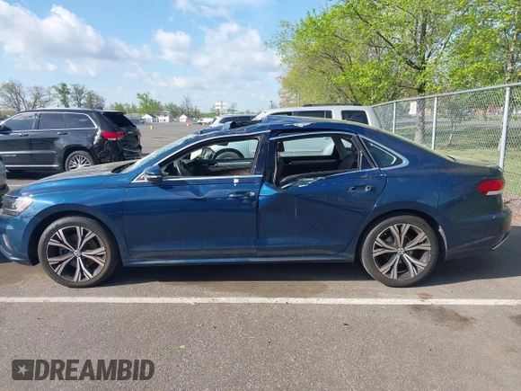 2021 Volkswagen Passat SE with VIN 1VWSA7A36MC010749, listed as a IAAI auction lot 42141065 with 43,571 mi miles and . Bid and sale history available at DreamBid. Image 14.