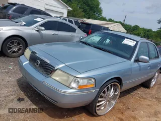 2003 Mercury Grand Marquis LS Premium z VIN 2MEFM75W63X623647, wystawiony jako IAAI lot #42236920 z przebiegiem 162 354 mil mil oraz . Historia ofert i sprzedaży dostępna na DreamBid. Obrazek 2.