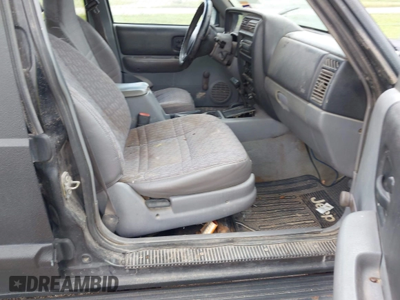 1997 Jeep Cherokee Sport with VIN 1J4FJ68S0VL576171, listed as a IAAI auction lot 42588055 with 212,360 mi miles and . Bid and sale history available at DreamBid. Image 5.