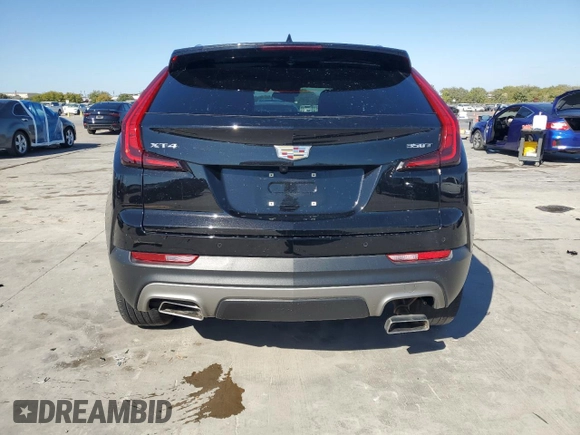 2022 Cadillac XT4 FWD Premium Luxury с VIN 1GYFZCR48NF105892, выставлен на аукционе Copart как лот 76684034 с пробегом 44 400 миль миль и Списание • Salvage title. История ставок и продаж доступна на DreamBid. Изображение 6.