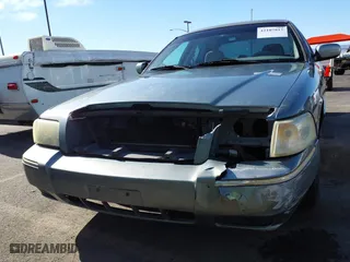 2006 Mercury Grand Marquis GS with VIN 2MEFM74V16X650056, listed as a IAAI auction lot 42107815 with 156,710 mi miles. Bid and sale history available at carsss.com. Image 6.