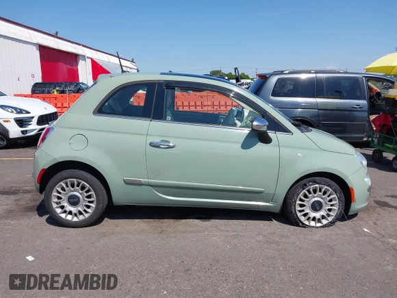 2013 FIAT 500 Lounge with VIN 3C3CFFCR5DT739516, listed as a IAAI auction lot 42439476 with 62,919 mi miles and . Bid and sale history available at DreamBid. Image 13.