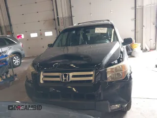 2007 Honda Pilot EX-L with VIN 2HKYF18647H504953, listed as a IAAI auction lot 41750435 with 186,097 mi miles and . Bid and sale history available at DreamBid. Image 12.