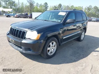 2010 Jeep Grand Cherokee Laredo with VIN 1J4PR4GK5AC120373, listed as a IAAI auction lot 42071835 with 101,949 mi miles. Bid and sale history available at carsss.com. Image 2.