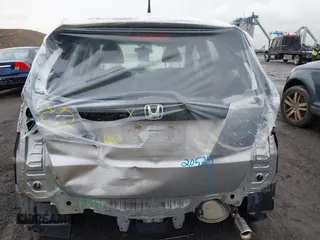 2009 Honda Fit Sport with VIN JHMGE88419S013460, listed as a IAAI auction lot 41994669 with 78,954 mi miles. Bid and sale history available at carsss.com. Image 6.