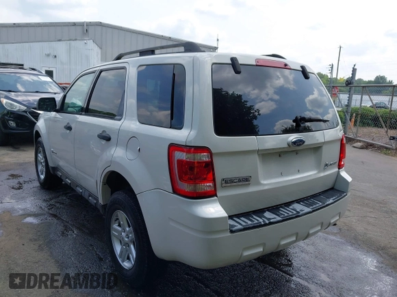 2009 Ford Escape Hybrid with VIN 1FMCU49359KA49066, listed as a IAAI auction lot 42419259 with 199,722 mi miles and . Bid and sale history available at DreamBid. Image 3.