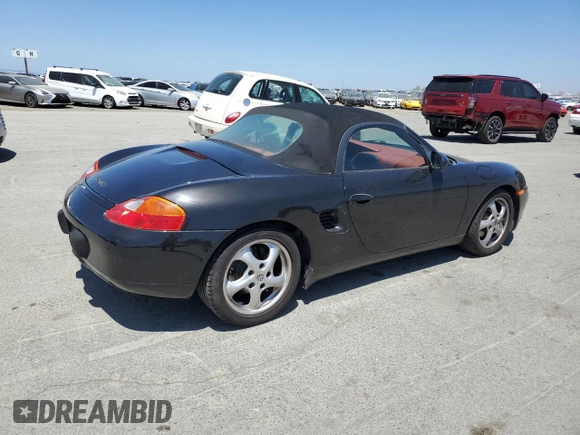 2000 Porsche Boxster с VIN WP0CA2983YU620909, выставлен на аукционе Copart как лот 58087035 с пробегом 99 845 миль миль и Чистый • Clean title. История ставок и продаж доступна на DreamBid. Изображение 3.