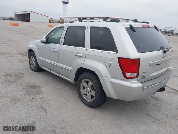 2007 Jeep Grand Cherokee Overland with VIN 1J8HR68237C676686, listed as a IAAI auction lot 42073411 with 194,524 mi miles. Bid and sale history available at carsss.com. Image 3.