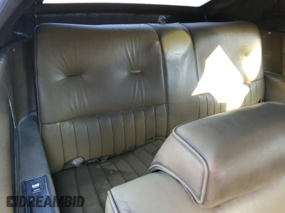 1971 Cadillac Eldorado z VIN 693671Q424620, wystawiony jako Copart lot #48917885 z przebiegiem Nie podano mil oraz Szkoda całkowita • Salvage title. Historia ofert i sprzedaży dostępna na DreamBid. Obrazek 10.