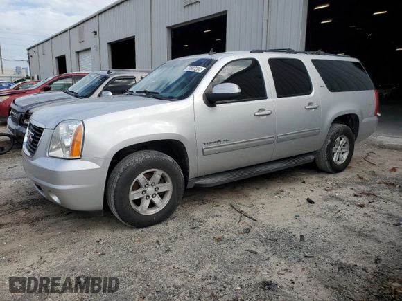 2014 GMC Yukon XL SLT with VIN 1GKS1KE03ER234487, listed as a Copart auction lot 74897284 with 198,965 mi miles and Salvage Title. Bid and sale history available at carsss.com. Image 1.