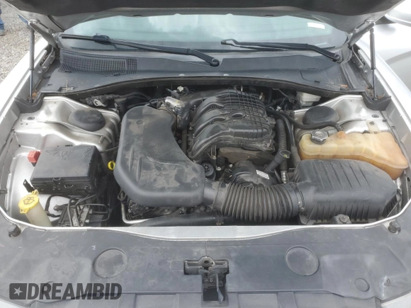 2012 Dodge Charger SE with VIN 2C3CDXBG4CH203207, listed as a Copart auction lot 69533004 with 156,015 mi miles and Salvage Title. Bid and sale history available at DreamBid. Image 11.