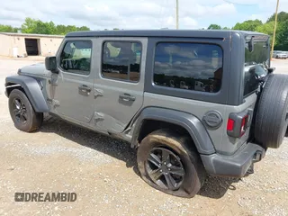 2020 Jeep Wrangler Unlimited Freedom with VIN 1C4HJXDG2LW186027, listed as a IAAI auction lot 42449664 with 87,869 mi miles and . Bid and sale history available at DreamBid. Image 3.