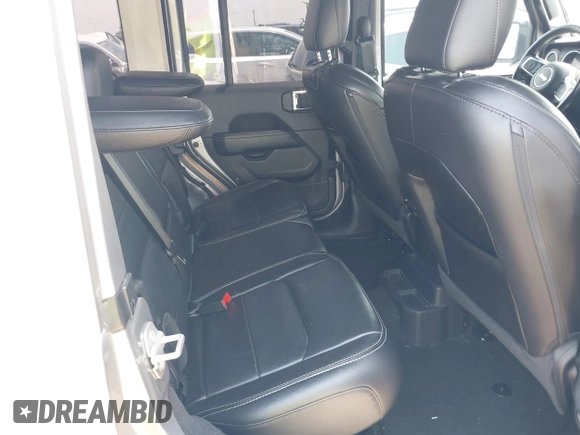 2021 Jeep Wrangler Unlimited High Altitude with VIN 1C4HJXEG3MW511185, listed as a IAAI auction lot 42125883 with 45,564 mi miles and . Bid and sale history available at DreamBid. Image 8.