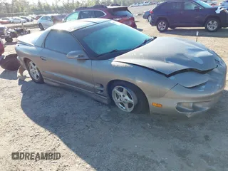 2000 Pontiac Firebird with VIN 2G2FS22K0Y2112410, listed as a IAAI auction lot 41676541 with 129,857 mi miles. Bid and sale history available at carsss.com. Image 1.
