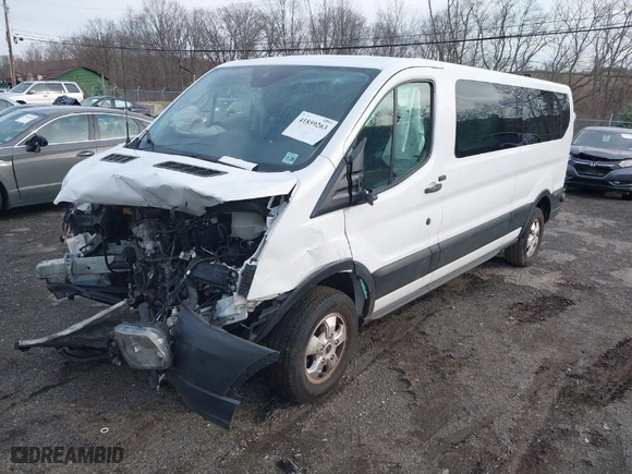 2019 Ford Transit Passenger Wagon XL with VIN 1FBZX2ZM2KKB63281, listed as a IAAI auction lot 41859263 with 39,294 mi miles. Bid and sale history available at carsss.com. Image 2.