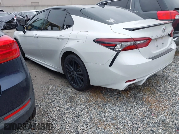 2022 Toyota Camry TRD with VIN 4T1KZ1AK4NU068897, listed as a IAAI auction lot 41851894 with 45,160 mi miles and . Bid and sale history available at DreamBid. Image 3.