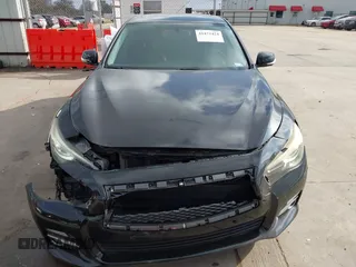 2015 Infiniti Q50 z VIN JN1BV7AP3FM335871, wystawiony jako IAAI lot #41472424 z przebiegiem 127 383 mil mil oraz . Historia ofert i sprzedaży dostępna na DreamBid. Obrazek 6.