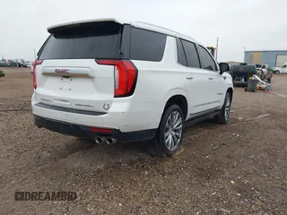 2021 GMC Yukon Denali with VIN 1GKS2DKL0MR178210, listed as a IAAI auction lot 41934532 with 91,785 mi miles. Bid and sale history available at carsss.com. Image 4.