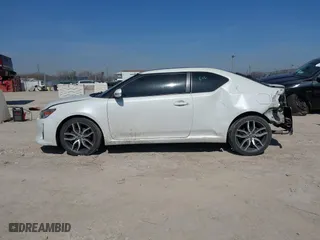 2016 Scion tC with VIN JTKJF5C70GJ019590, listed as a IAAI auction lot 41798426 with 69,045 mi miles. Bid and sale history available at carsss.com. Image 14.