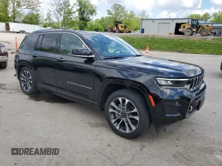2023 Jeep Grand Cherokee Overland with VIN 1C4RJHDG0PC670537, listed as a Copart auction lot 56757285 with 24,735 mi miles and Salvage title. Bid and sale history available at DreamBid. Image 4.