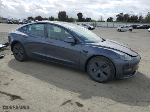 2023 Tesla Model 3 with VIN 5YJ3E1EA8PF610083, listed as a Copart auction lot 50982545 with 43,461 mi miles and Salvage Title. Bid and sale history available at carsss.com. Image 4.