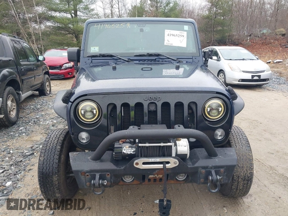 2013 Jeep Wrangler Rubicon 10th Anniversary with VIN 1C4BJWCG7DL544145, listed as a IAAI auction lot 41965259 with 125,900 mi miles and . Bid and sale history available at carsss.com. Image 13.