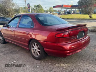 1999 Ford Contour SE Fleet z VIN 1FAFP66L2XK149217, wystawiony jako Copart lot #79546104 z przebiegiem 231 245 mil mil oraz Tytuł czysty. Historia ofert i sprzedaży dostępna na DreamBid. Obrazek 3.