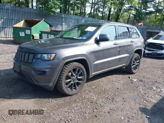 2017 Jeep Grand Cherokee Altitude with VIN 1C4RJFAG4HC807439, listed as a IAAI auction lot 42468652 with 149,807 mi miles and . Bid and sale history available at DreamBid. Image 18.