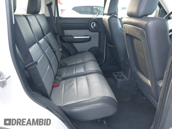 2008 Dodge Nitro SLT with VIN 1D8GT58K68W288772, listed as a IAAI auction lot 41621789 with 187,410 mi miles. Bid and sale history available at carsss.com. Image 8.