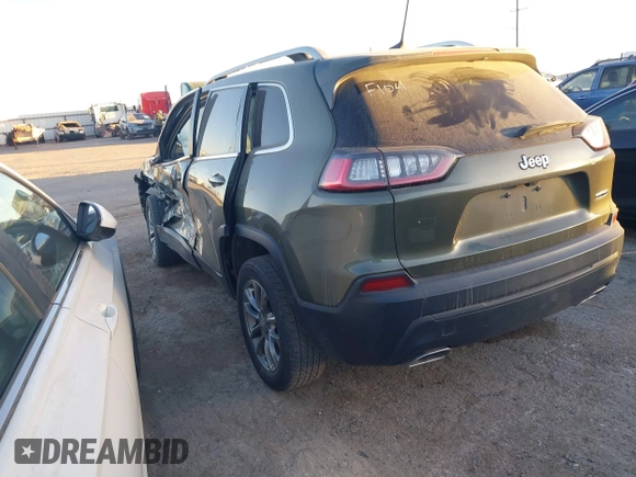 2019 Jeep Cherokee Latitude Plus with VIN 1C4PJLLN0KD164168, listed as a IAAI auction lot 41197248 with 118,278 mi miles and . Bid and sale history available at DreamBid. Image 3.