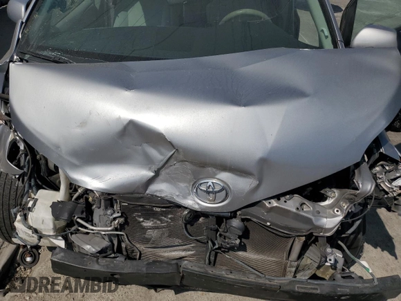 2012 Toyota Sienna LE AAS with VIN 5TDKK3DC2CS207404, listed as a Copart auction lot 62781215 with 200,757 mi miles and Salvage title. Bid and sale history available at DreamBid. Image 12.