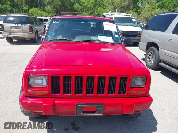 1998 Jeep Cherokee Sport with VIN 1J4FT68S2WL256846, listed as a IAAI auction lot 41998490 with 198,936 mi miles. Bid and sale history available at carsss.com. Image 6.