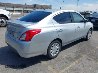 2015 Nissan Versa SV with VIN 3N1CN7AP1FL846929, listed as a IAAI auction lot 42068428 with 104,773 mi miles. Bid and sale history available at carsss.com. Image 4.