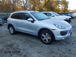 2012 Porsche Cayenne S Hybrid with VIN WP1AE2A25CLA90720, listed as a Copart auction lot 76467154 with 100,460 mi miles and Clean title. Bid and sale history available at DreamBid. Image 4.