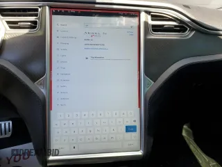 2013 Tesla Model S Performance с VIN 5YJSA1DP8DFP12766, выставлен на аукционе Copart как лот 50314155 с пробегом 55 820 миль миль и Списание • Salvage title. История ставок и продаж доступна на DreamBid. Изображение 9.