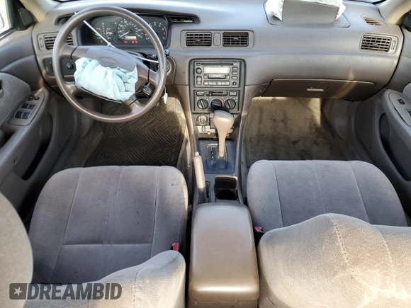 1999 Toyota Camry LE с VIN 4T1BG22K7XU516756, выставлен на аукционе Copart как лот 54065105 с пробегом 176 051 миль миль и Списание • Salvage title. История ставок и продаж доступна на DreamBid. Изображение 8.