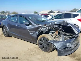 2022 Tesla Model S with VIN 5YJSA1E50NF491534, listed as a IAAI auction lot 40211030 with 1 mi miles. Bid and sale history available at carsss.com. Image 1.