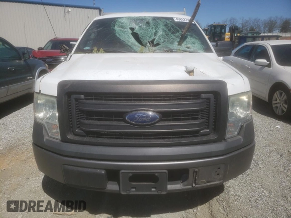 2014 Ford F-150 XL with VIN 1FTMF1CM7EKF68634, listed as a Copart auction lot 49832795 with 125,245 mi miles and Salvage Title. Bid and sale history available at carsss.com. Image 5.
