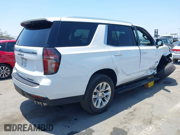 2023 Chevrolet Tahoe Premier with VIN 1GNSKSKD0PR262516, listed as a IAAI auction lot 42473875 with 83,461 mi miles and . Bid and sale history available at DreamBid. Image 4.