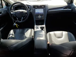 2020 Ford Fusion Titanium z VIN 3FA6P0RU3LR231920, wystawiony jako Copart lot #61643035 z przebiegiem 55 855 mil mil oraz Szkoda całkowita • Salvage title. Historia ofert i sprzedaży dostępna na DreamBid. Obrazek 8.