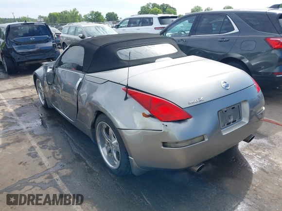 2004 Nissan 350Z Touring z VIN JN1AZ36A94T013851, wystawiony jako IAAI lot #42335966 z przebiegiem 180 814 mil mil oraz . Historia ofert i sprzedaży dostępna na DreamBid. Obrazek 3.