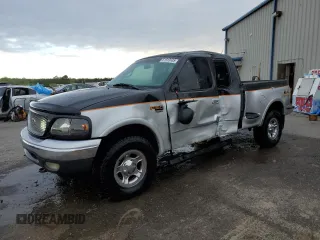 1999 Ford F-150 with VIN 2FTRX08WXXCA60270, listed as a Copart auction lot 51913935 with Not provided miles and Salvage title. Bid and sale history available at DreamBid. Image 1.